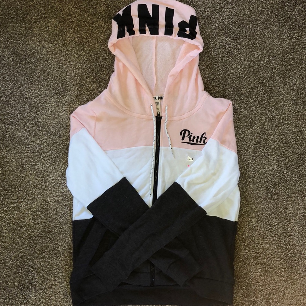 A women’s large PINK zip-up jacket